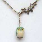Antiqued Brass Leaf Porcel..