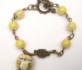 Antiqued Brass Branch Porcelain Owl Jade Bracelet