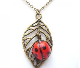 Antiqued Brass Leaf Porcelain Ladybug Necklace
