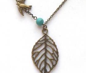 Antiqued Brass Leaf Turquoise Bird Necklace